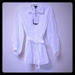 Bright white womens button down dress shirt.
